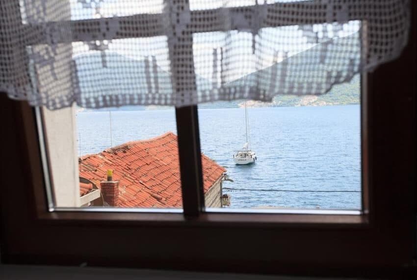 Apartments for sale in a stone house only 20 m from the sea, Kotor Bay